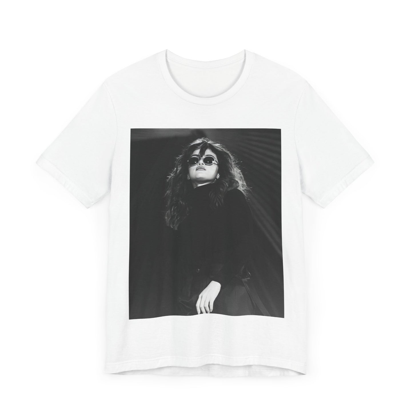 A black graphic t-shirt featuring a black and white, monochrome graphic or photo of Selena Gomez.