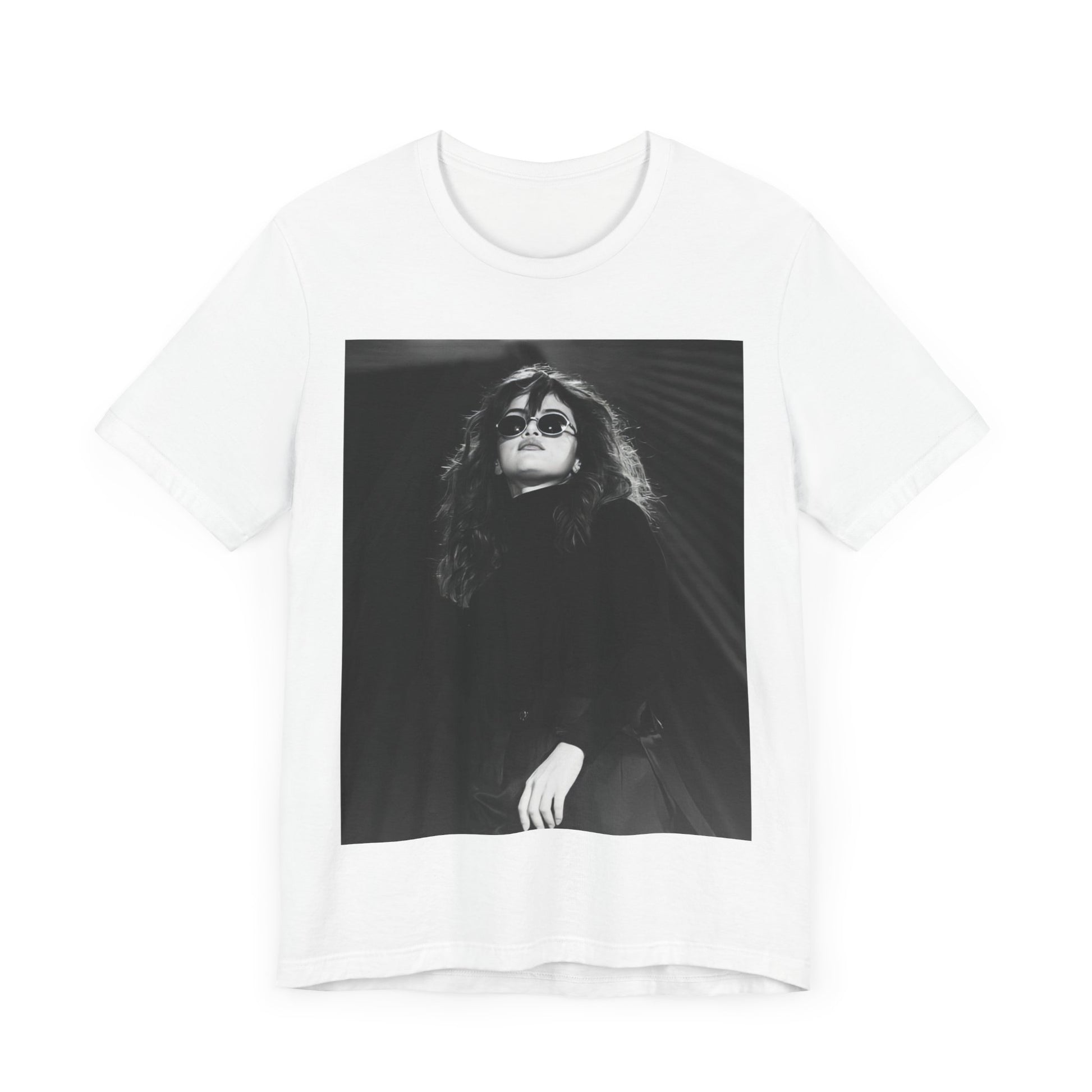 A black graphic t-shirt featuring a black and white, monochrome graphic or photo of Selena Gomez.
