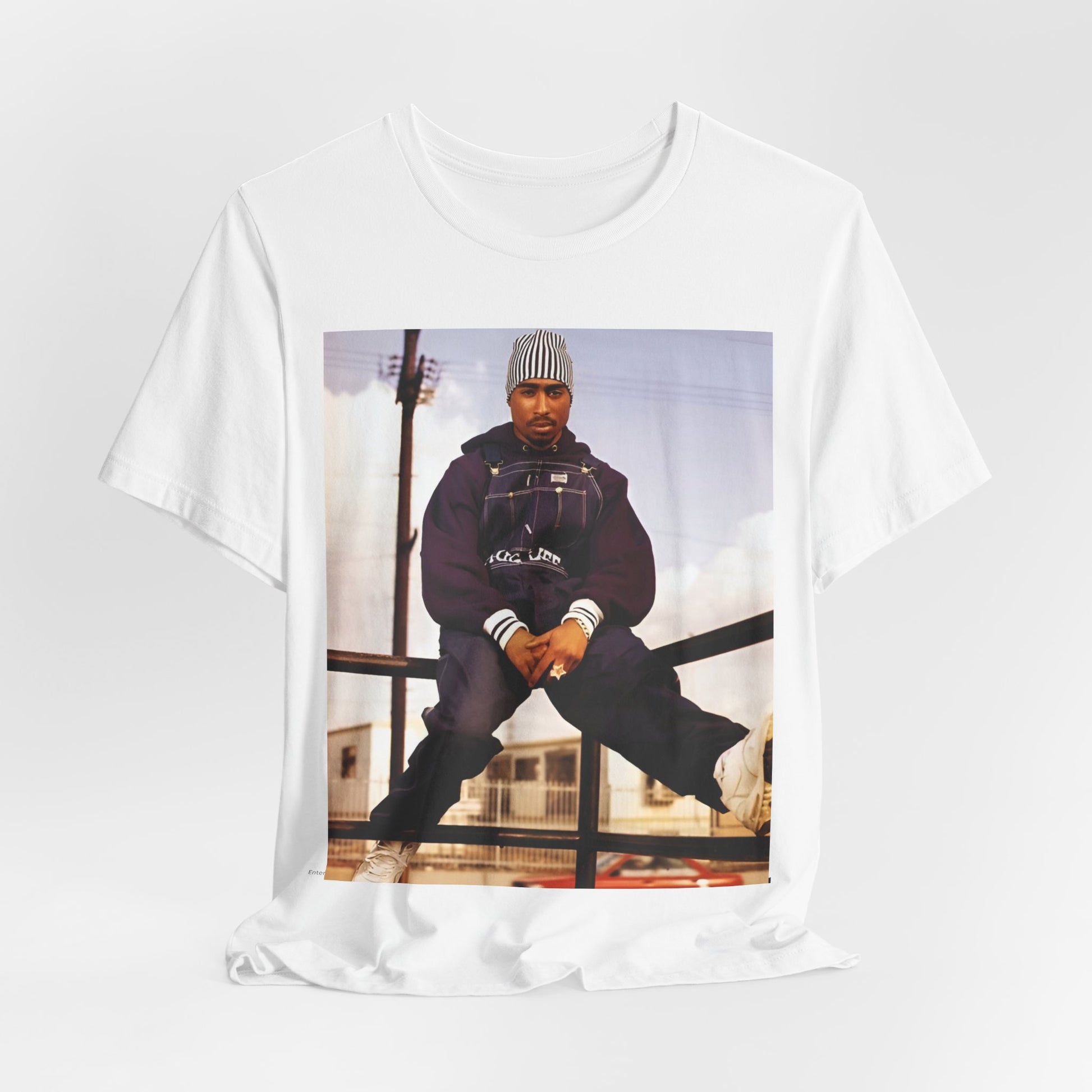 A black graphic t-shirt featuring a timeless rap legend graphic of Tupac.