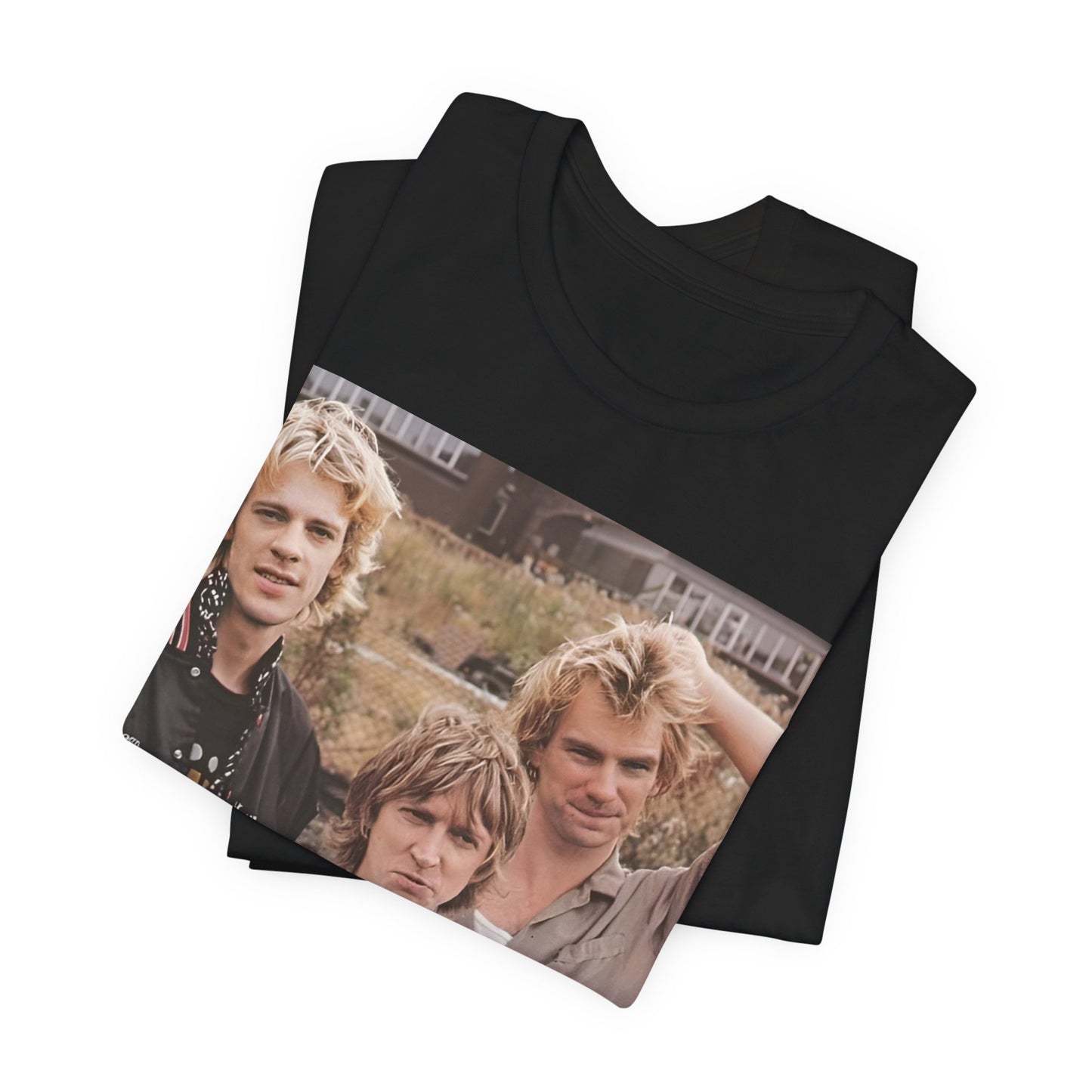 A black graphic t-shirt featuring a graphic of The Police as a timeless three-piece band.