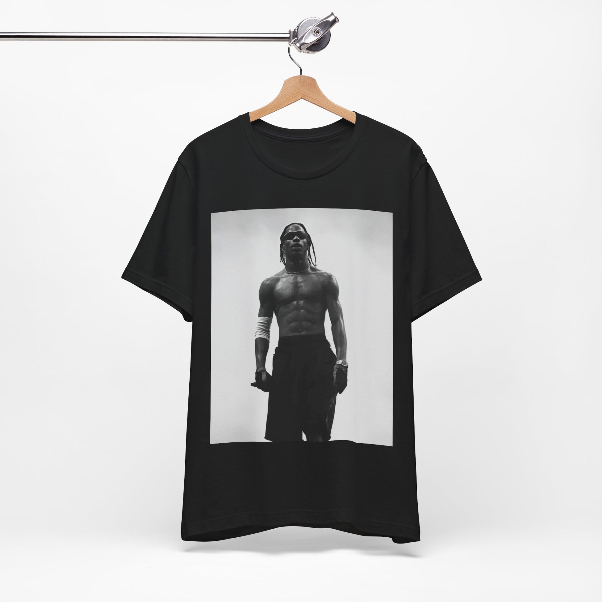 A black graphic t-shirt featuring a black and white portrait photo of Travis Scott.