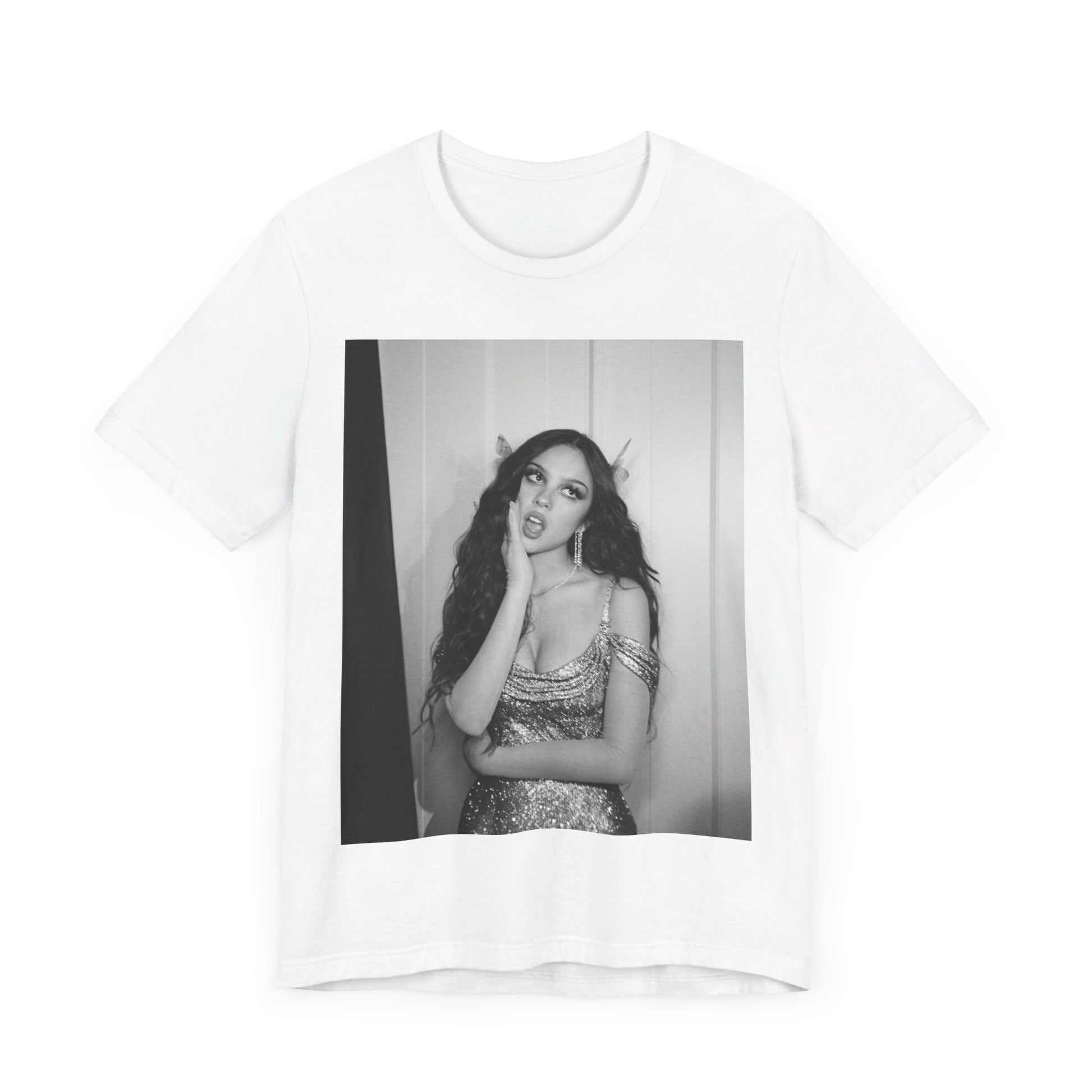 A black graphic t-shirt featuring a black and white, monochrome graphic or photo of Olivia Rodrigo.