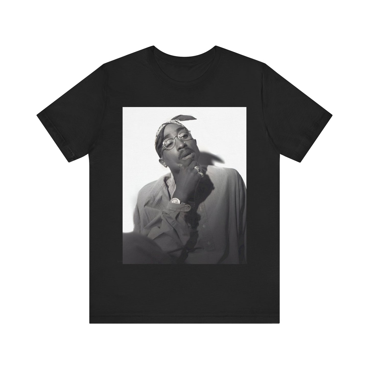A black graphic t-shirt featuring a classic 90s West Coast rap graphic of Tupac.