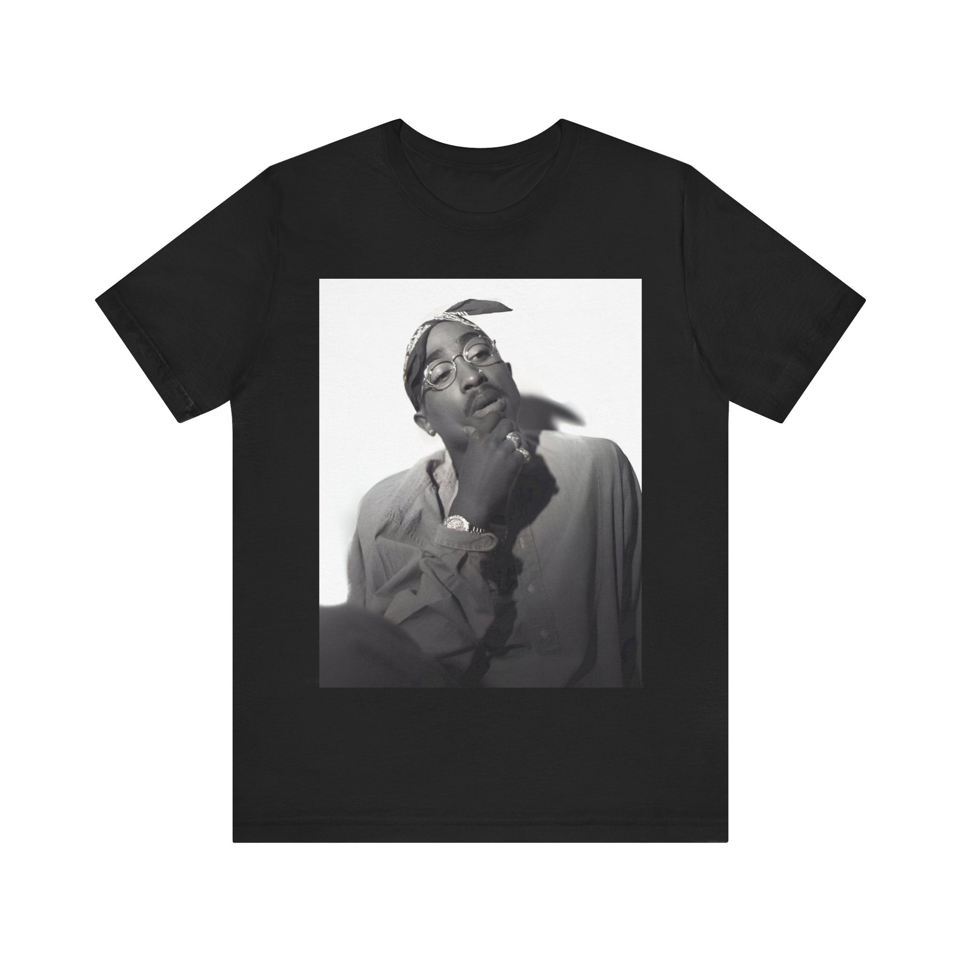 A black graphic t-shirt featuring a classic 90s West Coast rap graphic of Tupac.