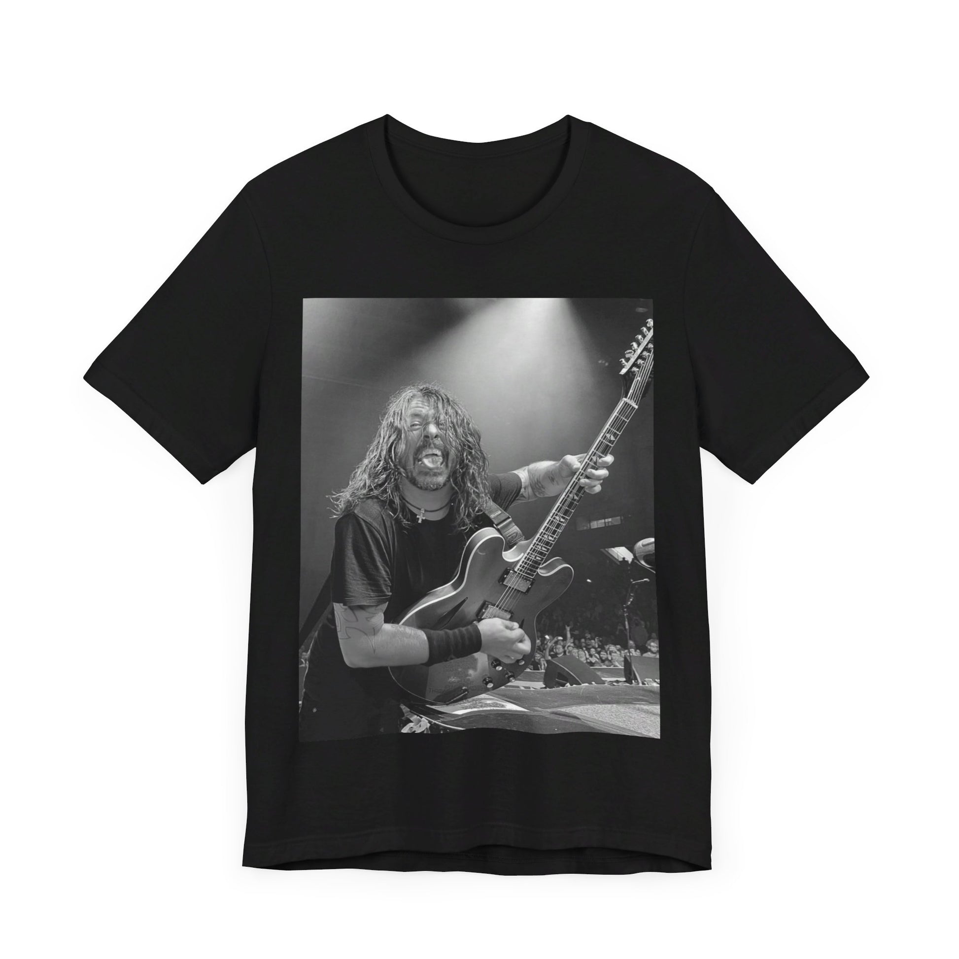 A black graphic t-shirt featuring a graphic of Dave Grohl from Foo Fighters playing guitar in concert.