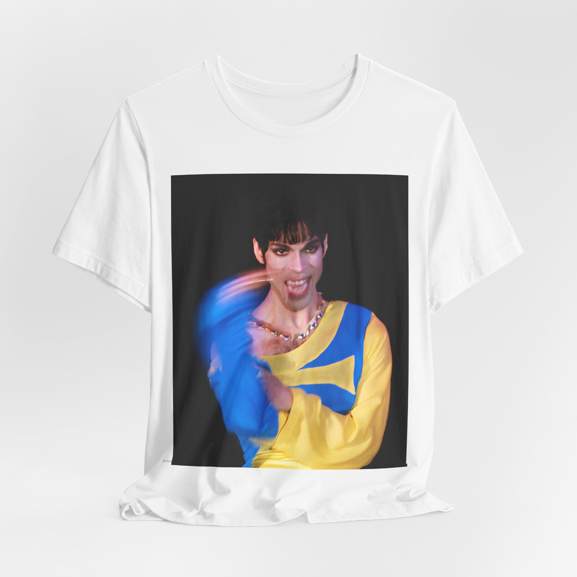 A black graphic t-shirt featuring a graphic related to Prince's 'When Doves Cry' song or era.