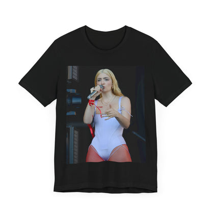 A black graphic t-shirt featuring a graphic or photo of Lorde performing on stage in a cool alternative music style.
