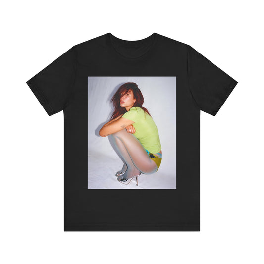 A black graphic t-shirt featuring a graphic inspired by Dua Lipa's 'Houdini' song.