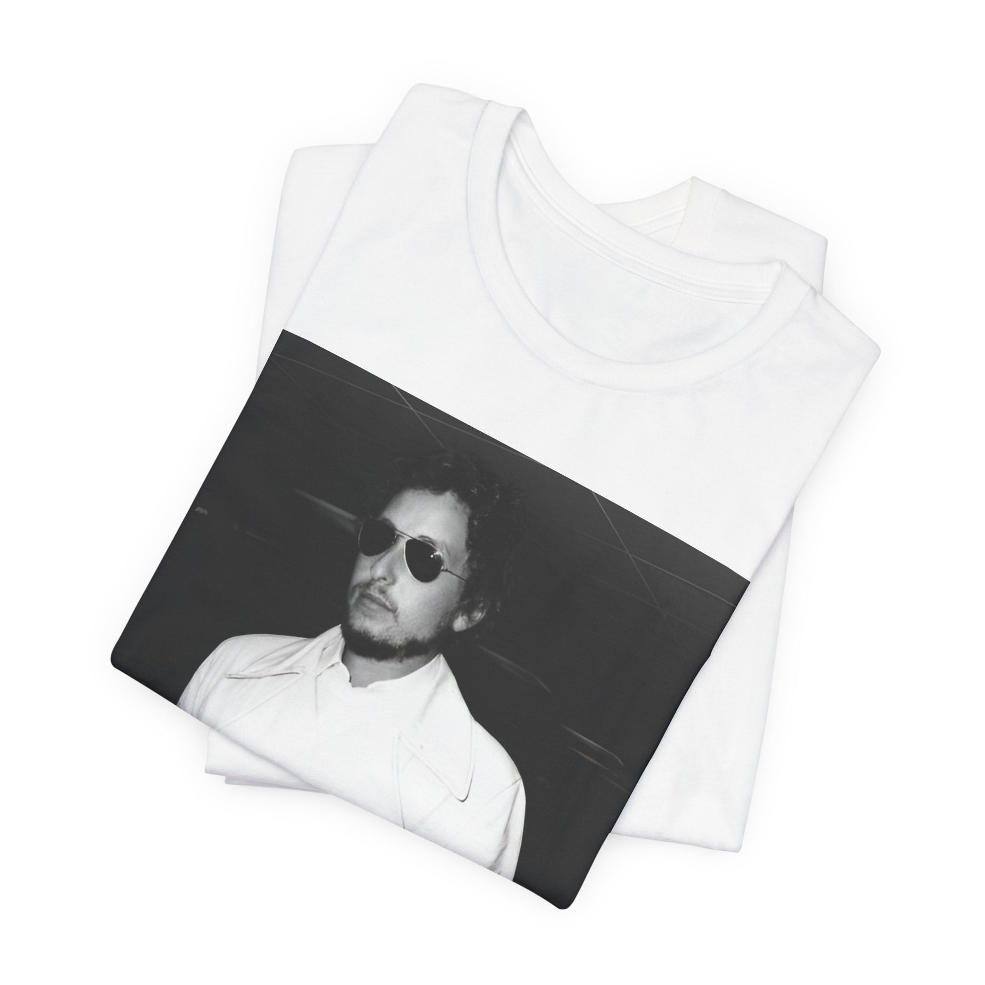 A black graphic t-shirt featuring a vintage black and white photo of Bob Dylan in a contemplative or iconic pose.