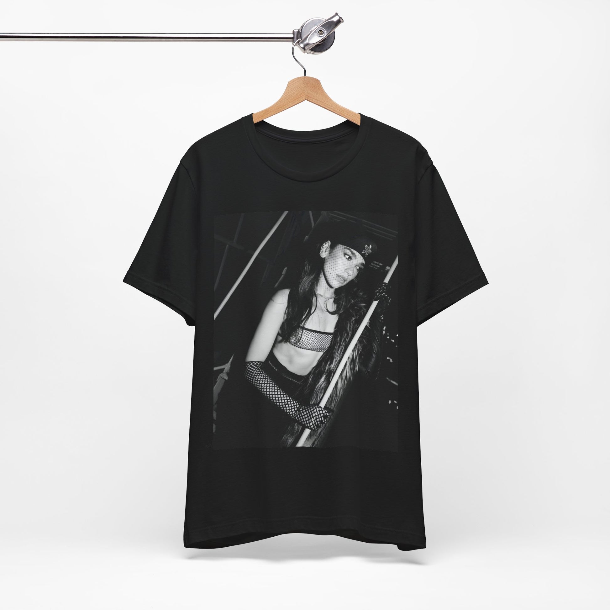A black graphic t-shirt featuring a black and white, monochrome graphic or portrait of Dua Lipa.