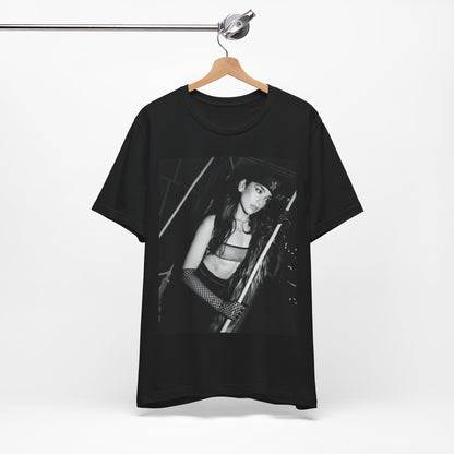 A black graphic t-shirt featuring a black and white, monochrome graphic or portrait of Dua Lipa.