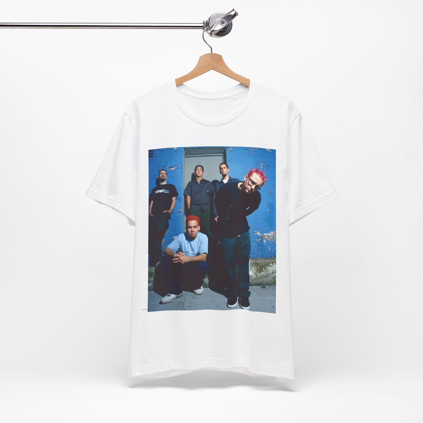A black graphic t-shirt featuring a graphic of Linkin Park as nu-metal pioneers.