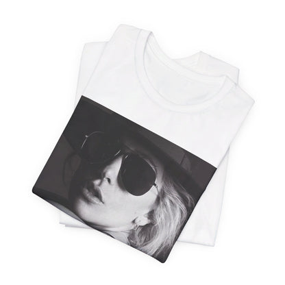A black graphic t-shirt featuring a fierce graphic related to Lady Gaga's 'Bad Romance' song or era.