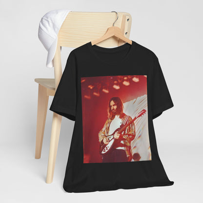 A black graphic t-shirt featuring a cool psychedelic journey graphic of Tame Impala.