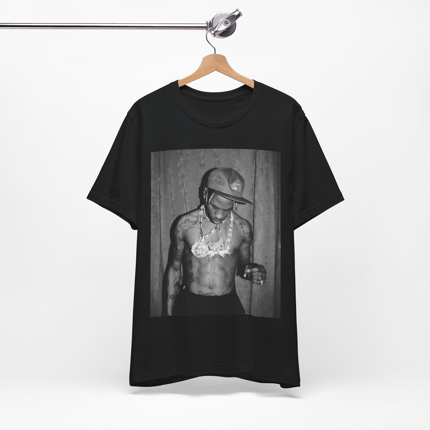 A black graphic t-shirt featuring a graphic of Travis Scott as the Houston rap king.
