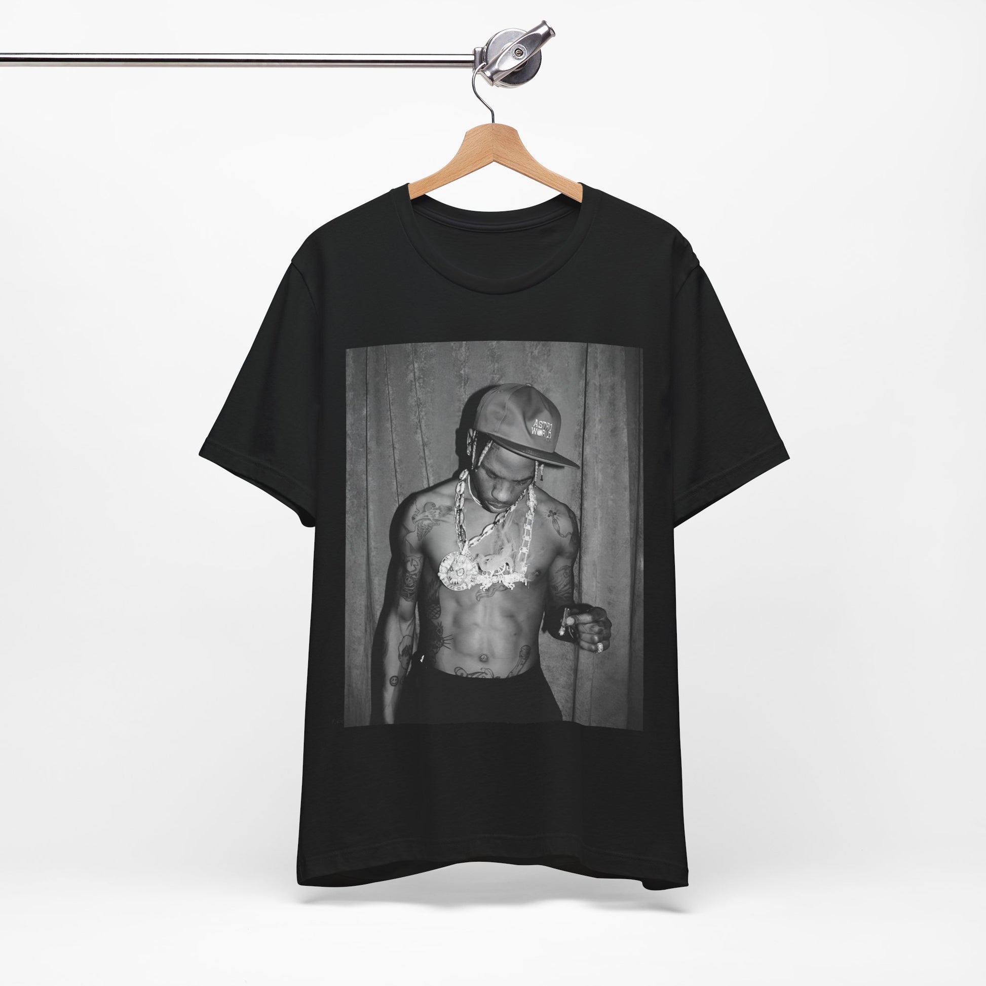 A black graphic t-shirt featuring a graphic of Travis Scott as the Houston rap king.