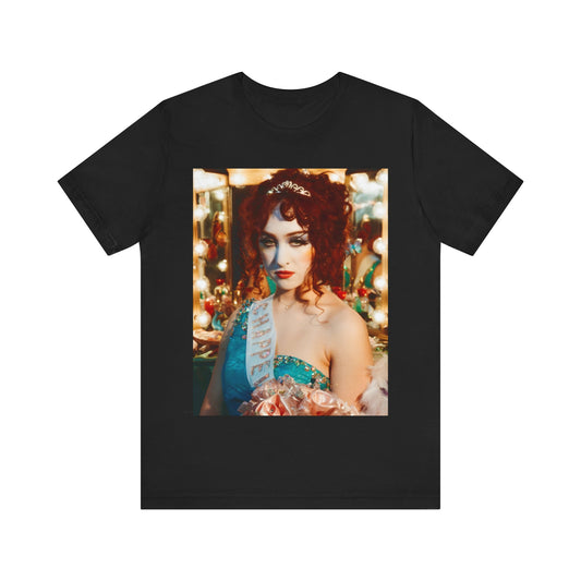 A black graphic t-shirt featuring a graphic of Chappell Roan in a bold stage costume.