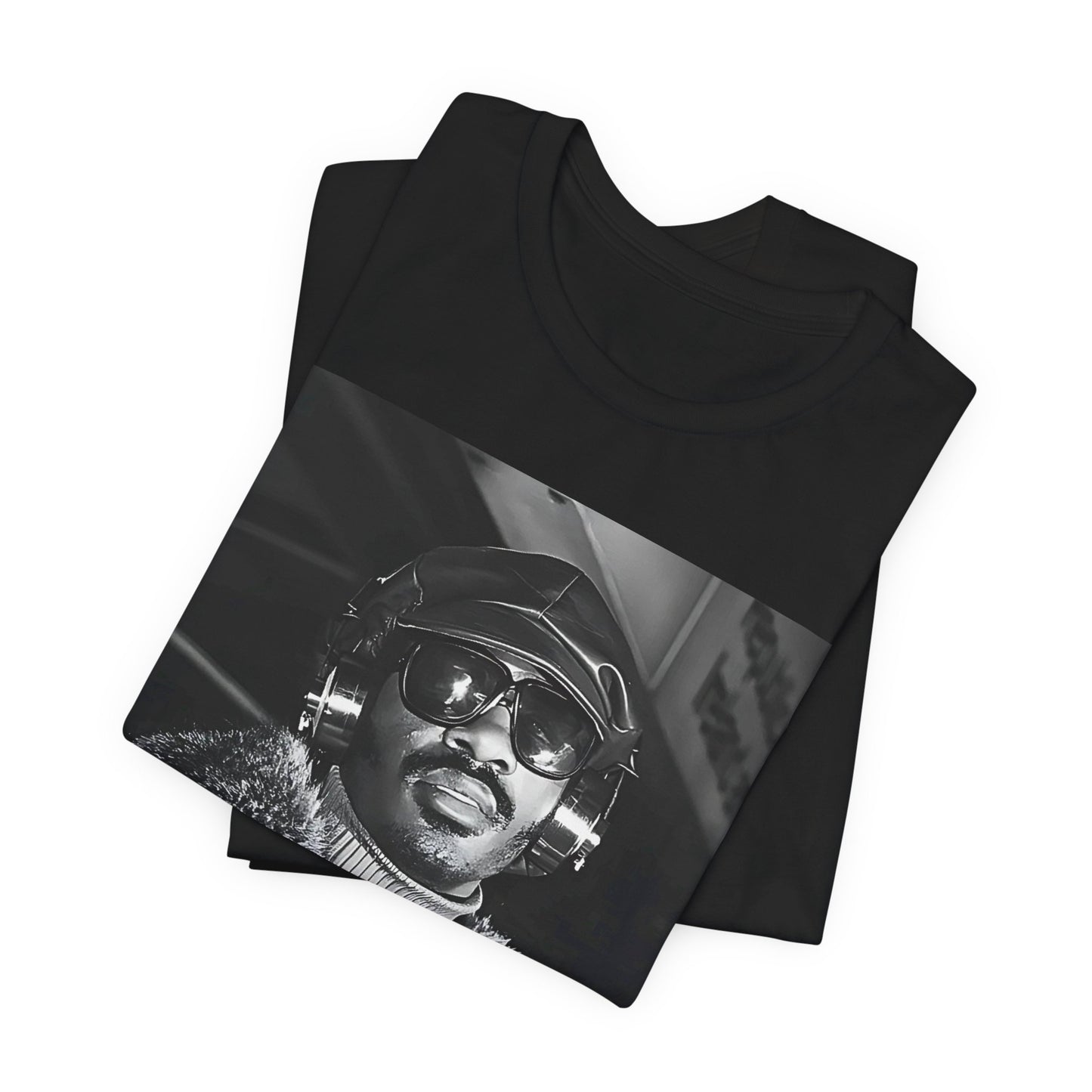 A black graphic t-shirt featuring a 70s black and white graphic of Stevie Wonder as a Motown legend.