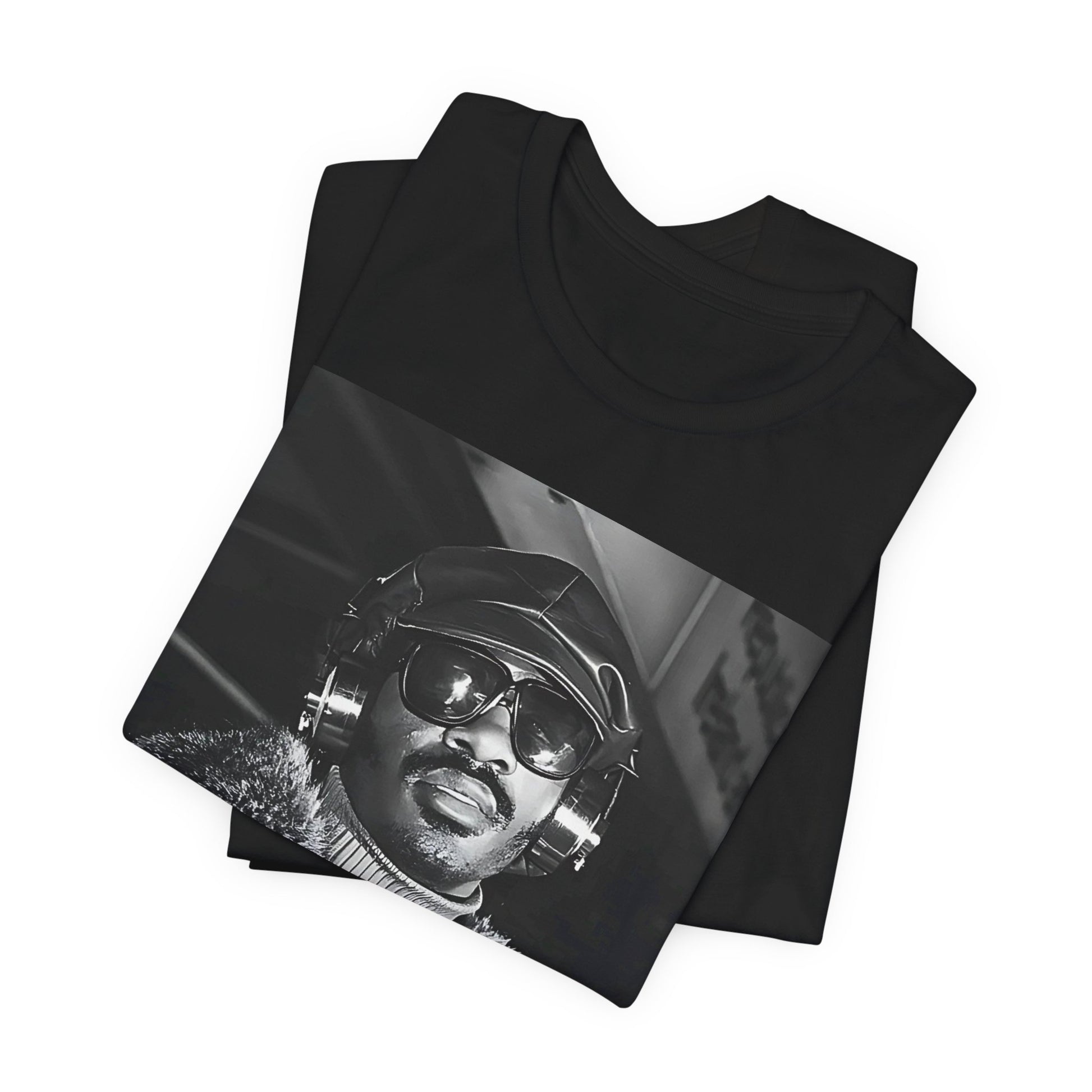 A black graphic t-shirt featuring a 70s black and white graphic of Stevie Wonder as a Motown legend.