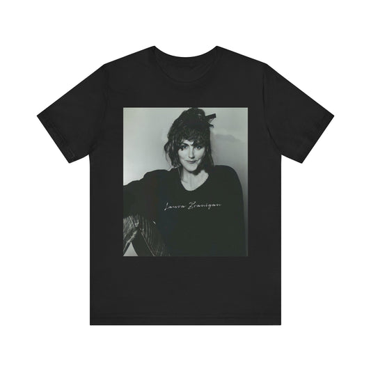 A black graphic t-shirt featuring a casual 80s pop fan graphic of Laura Branigan.