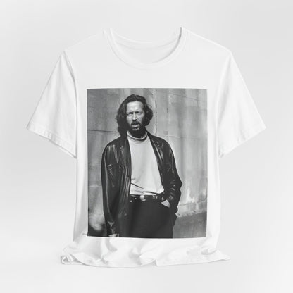 A black graphic t-shirt featuring a retro graphic related to Eric Clapton's 'Cocaine' song or era.