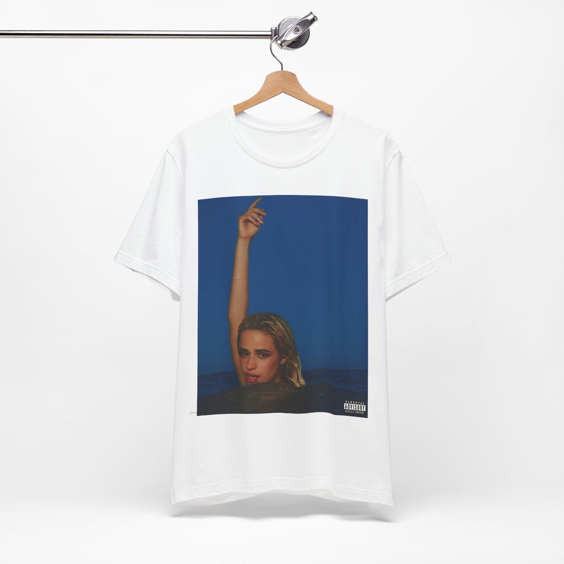 A black graphic t-shirt featuring a graphic related to Camila Cabello's C,XOXO album.