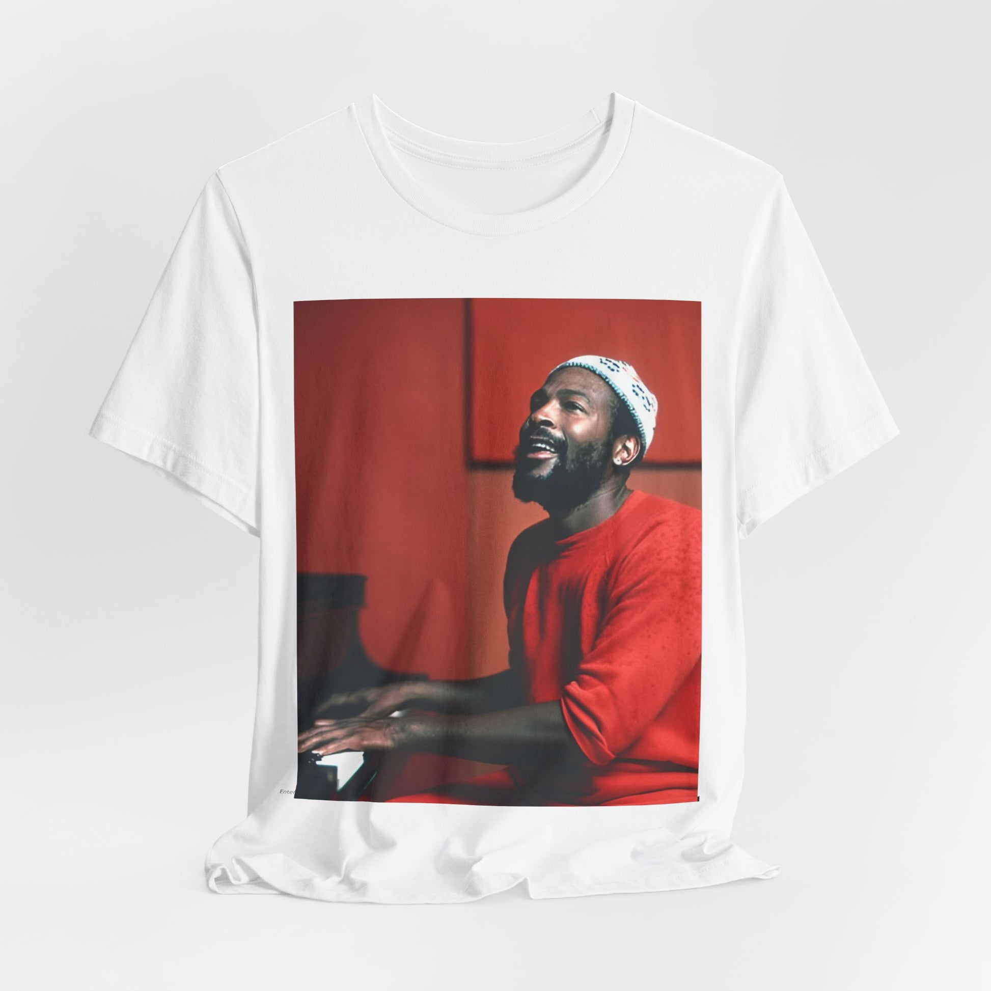 A black graphic t-shirt featuring a graphic of Marvin Gaye with a piano.