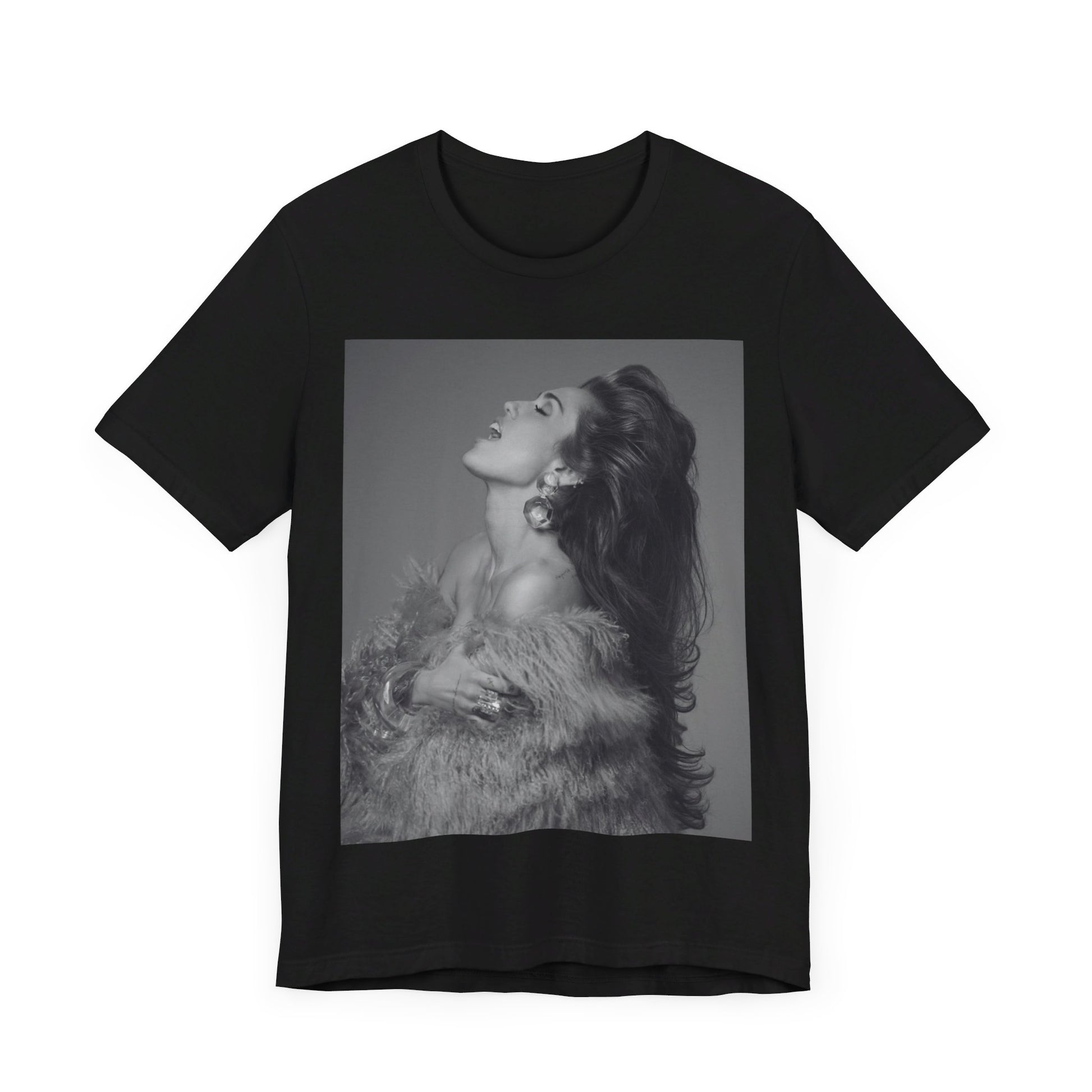 A black graphic t-shirt featuring a black and white portrait photo of Miley Cyrus.