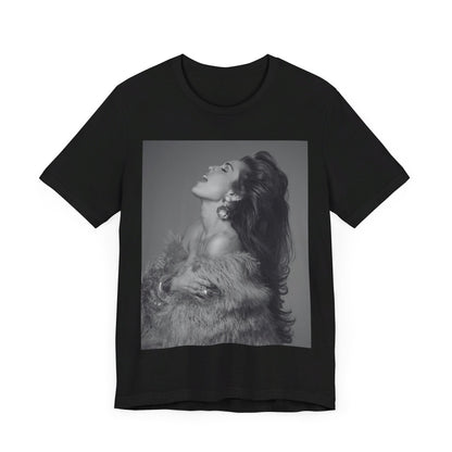 A black graphic t-shirt featuring a black and white portrait photo of Miley Cyrus.