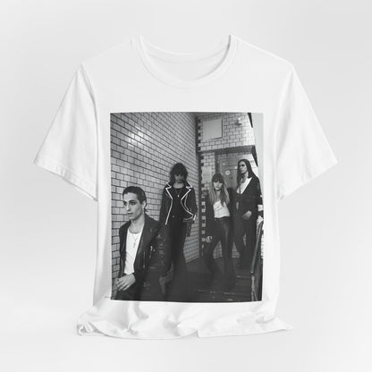 A black graphic t-shirt featuring a black and white graphic or photo of Maneskin in a backstage setting.