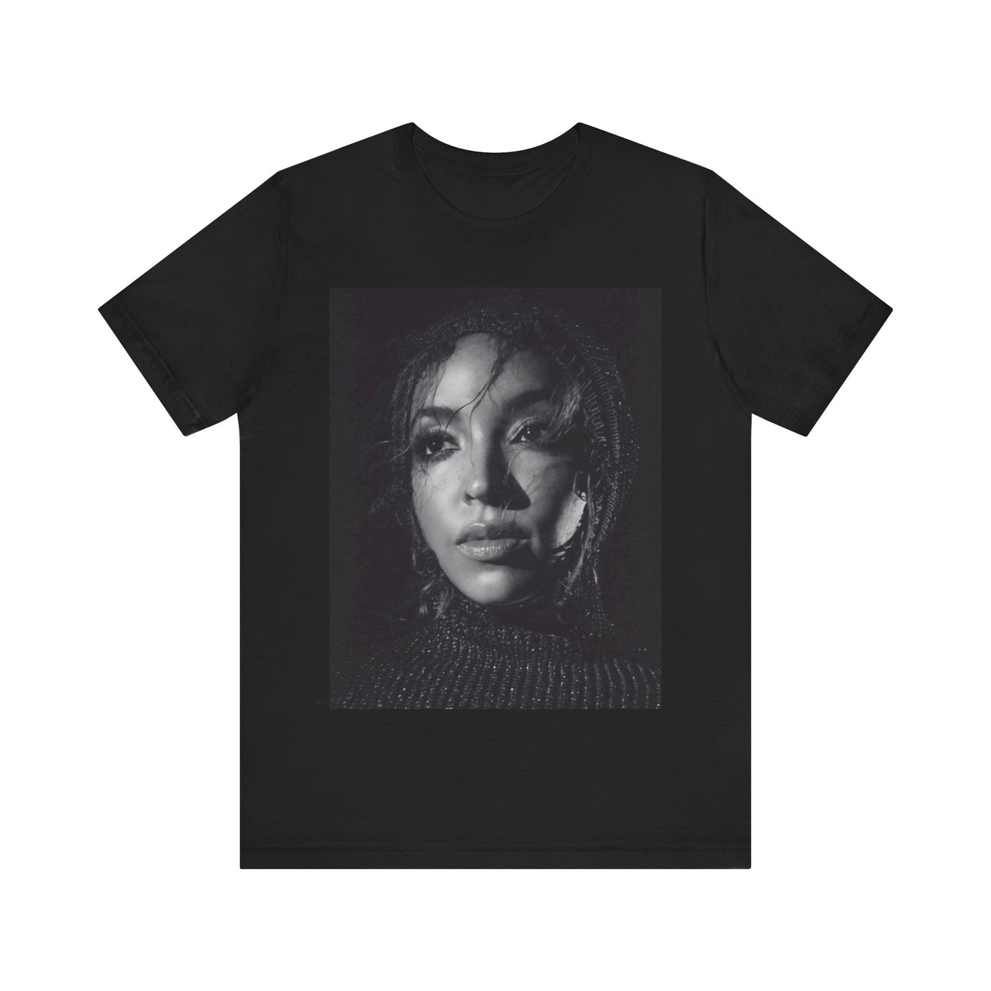 A black graphic t-shirt featuring a black and white portrait photo of Tinashe.