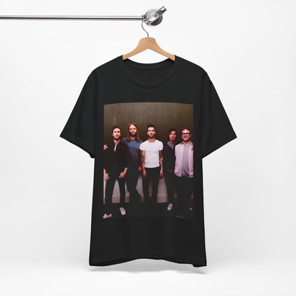 A black cotton Maroon 5 t-shirt featuring a graphic of an artistic, emotional heart design.