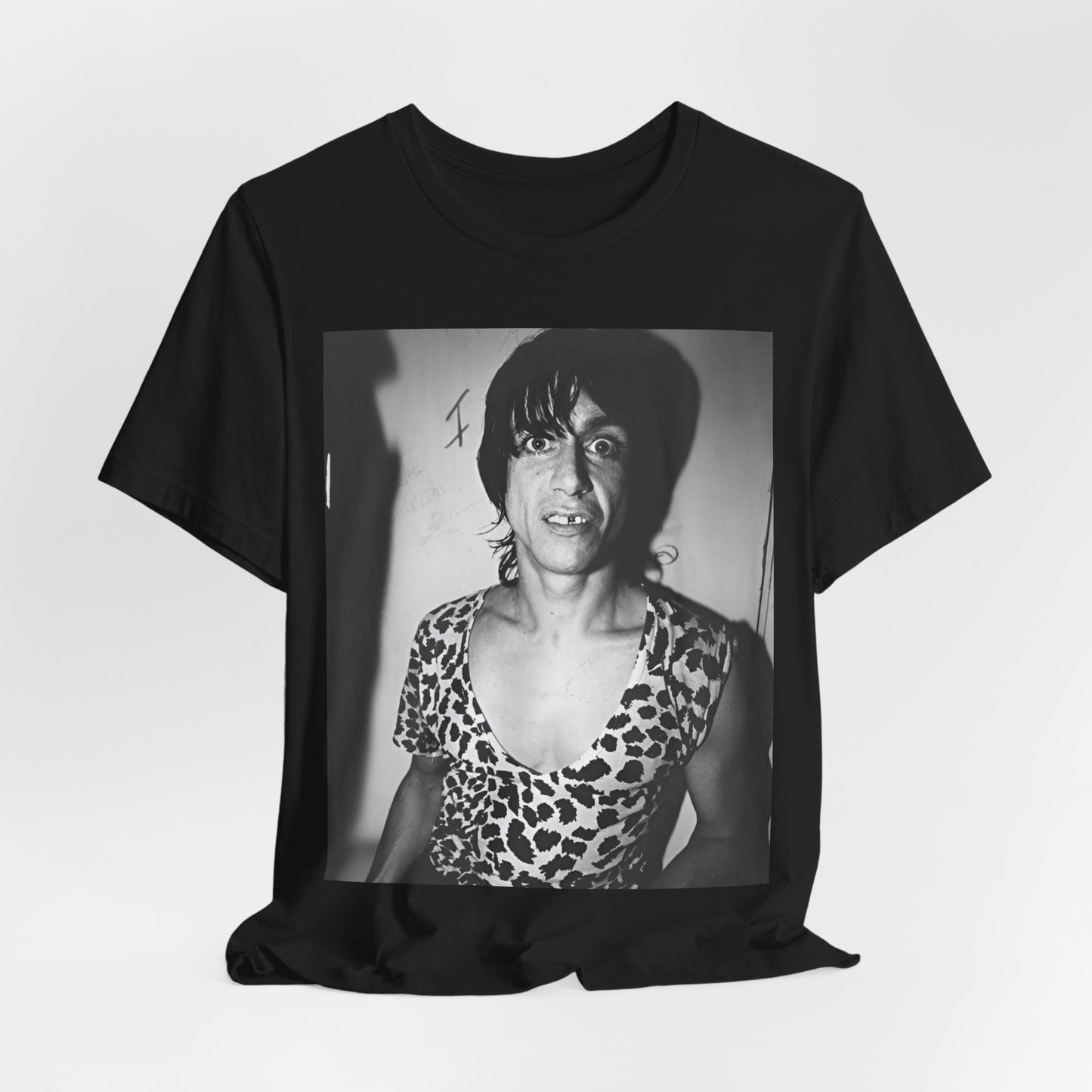 A black graphic t-shirt featuring a graphic of Iggy Pop and The Stooges in a punk style.