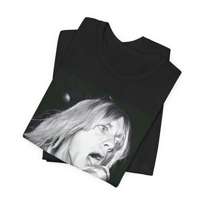 A black graphic t-shirt featuring a graphic of Iggy Pop as the Godfather of Punk, performing live.