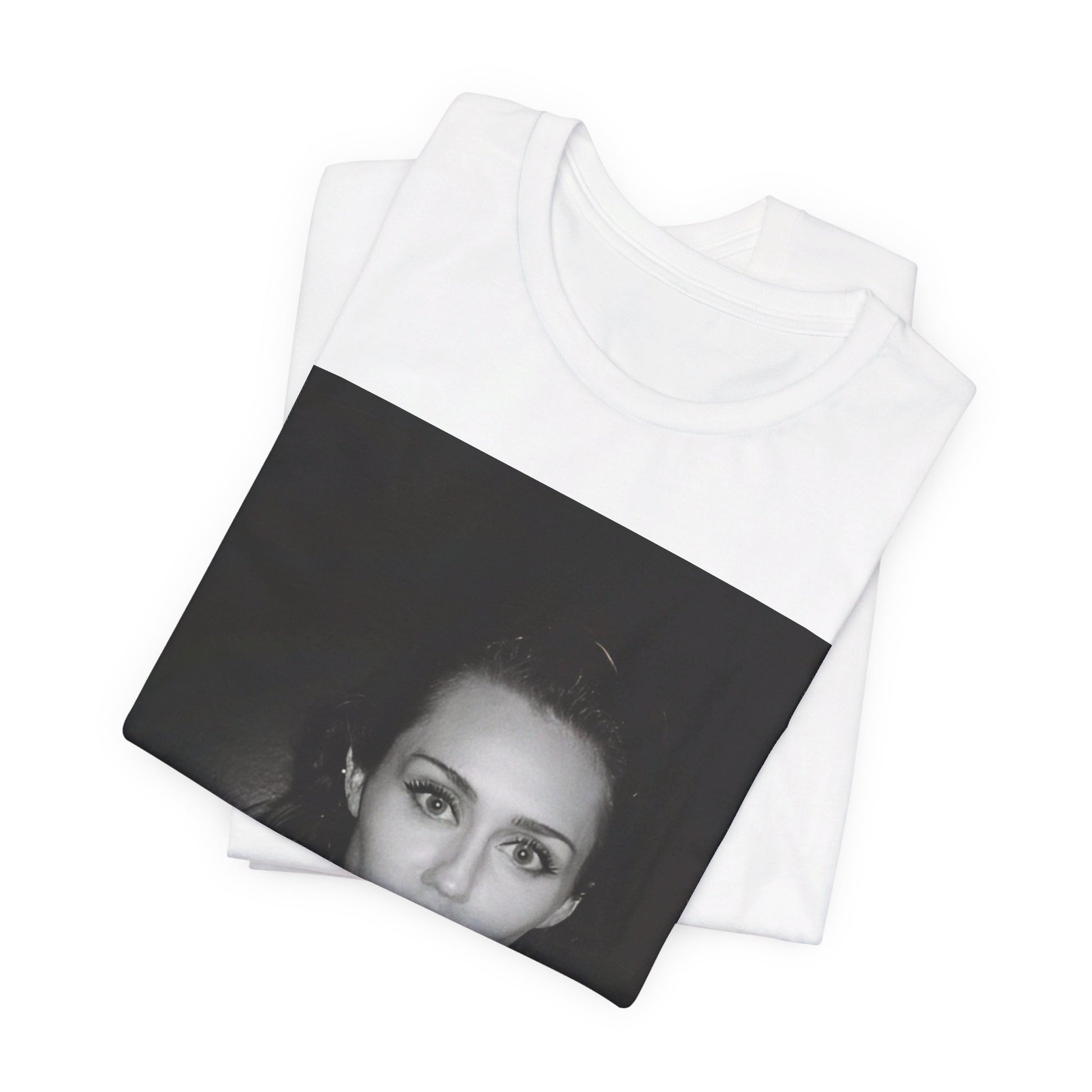 A black graphic t-shirt featuring a graphic related to Miley Cyrus' 'Flowers' song or era.