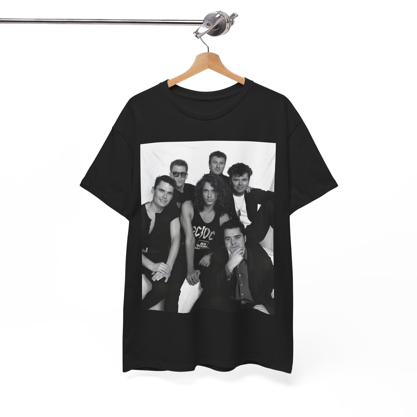 A black graphic t-shirt featuring an 80s rock aesthetic graphic of INXS.