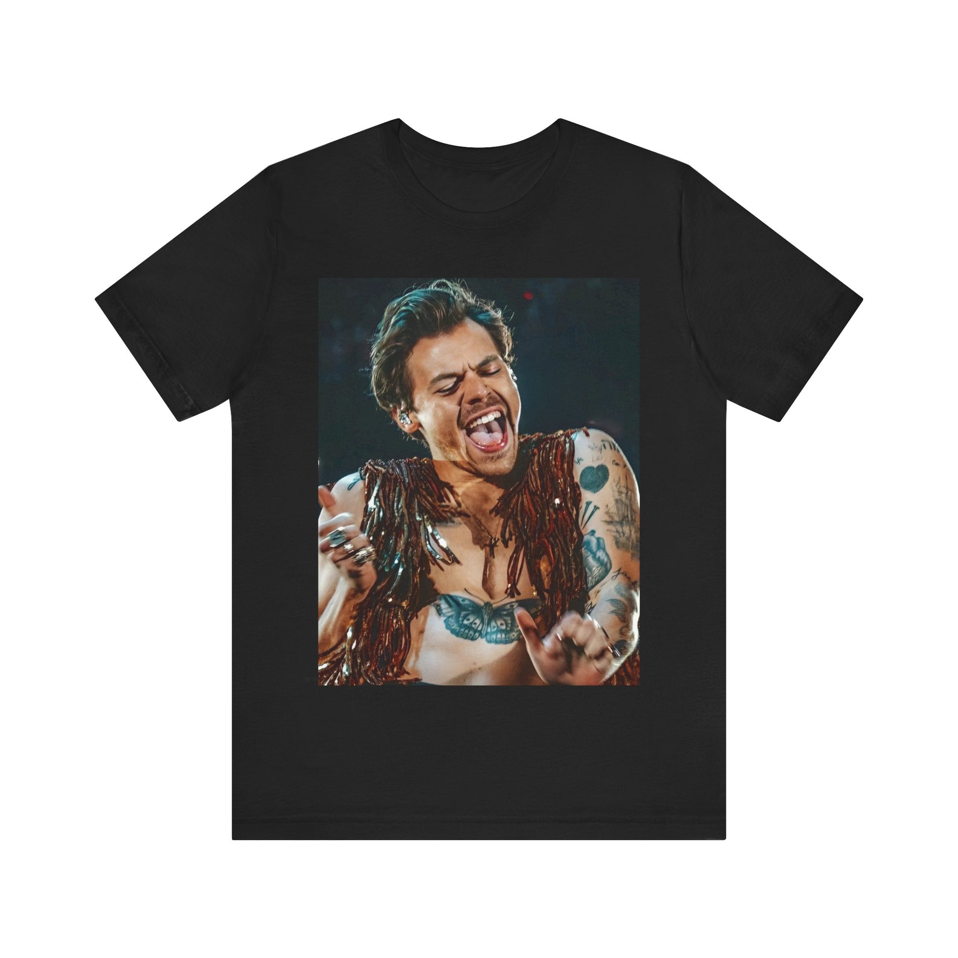A black graphic t-shirt featuring a graphic or photo of Harry Styles performing live on stage.