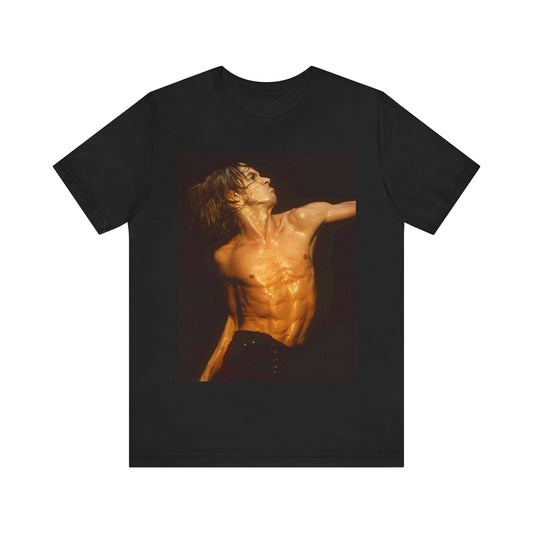 A black graphic t-shirt featuring an iconic photo of Iggy Pop performing live on stage.