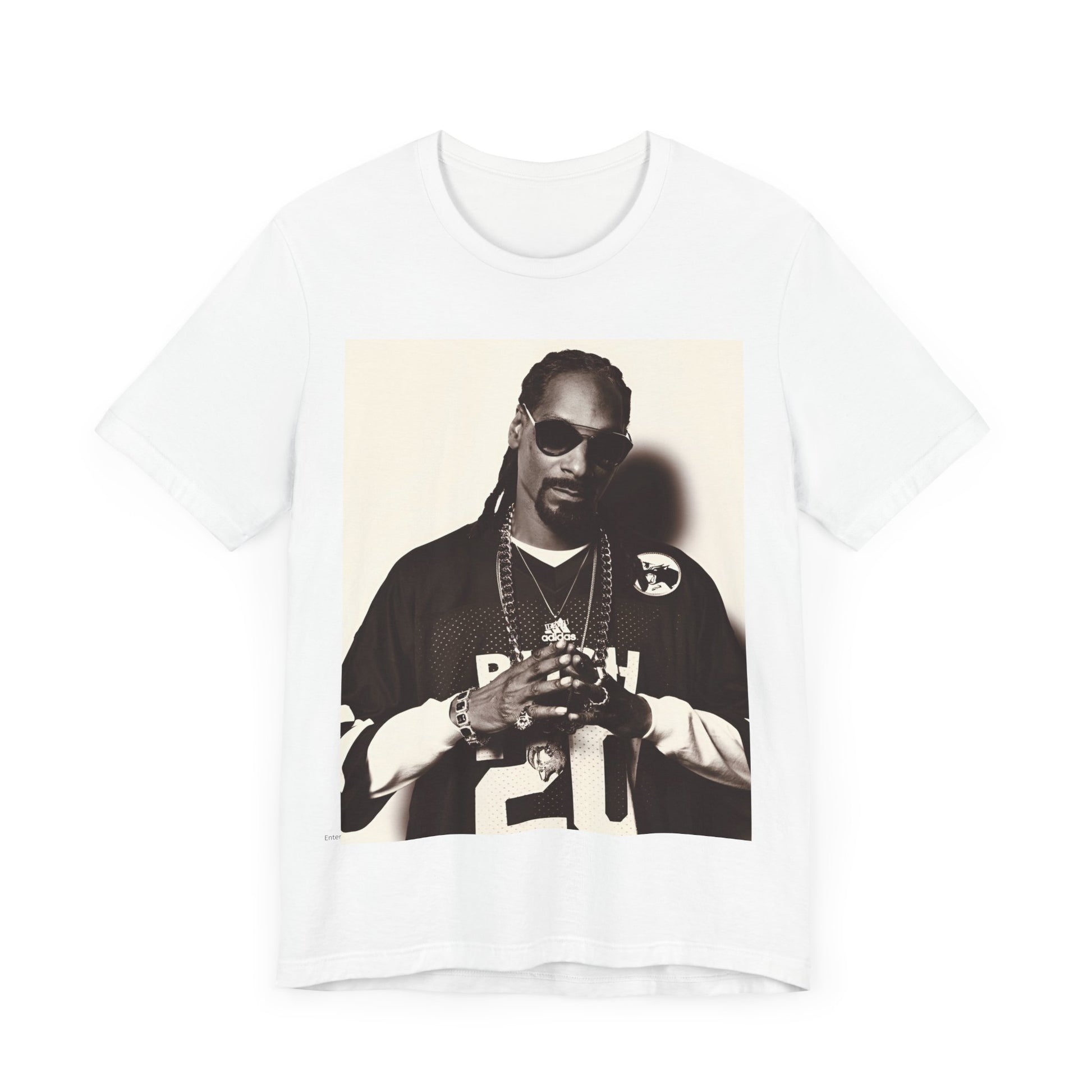 A black graphic t-shirt featuring a black and white, monochrome graphic or photo of Snoop Dogg in an OG style.