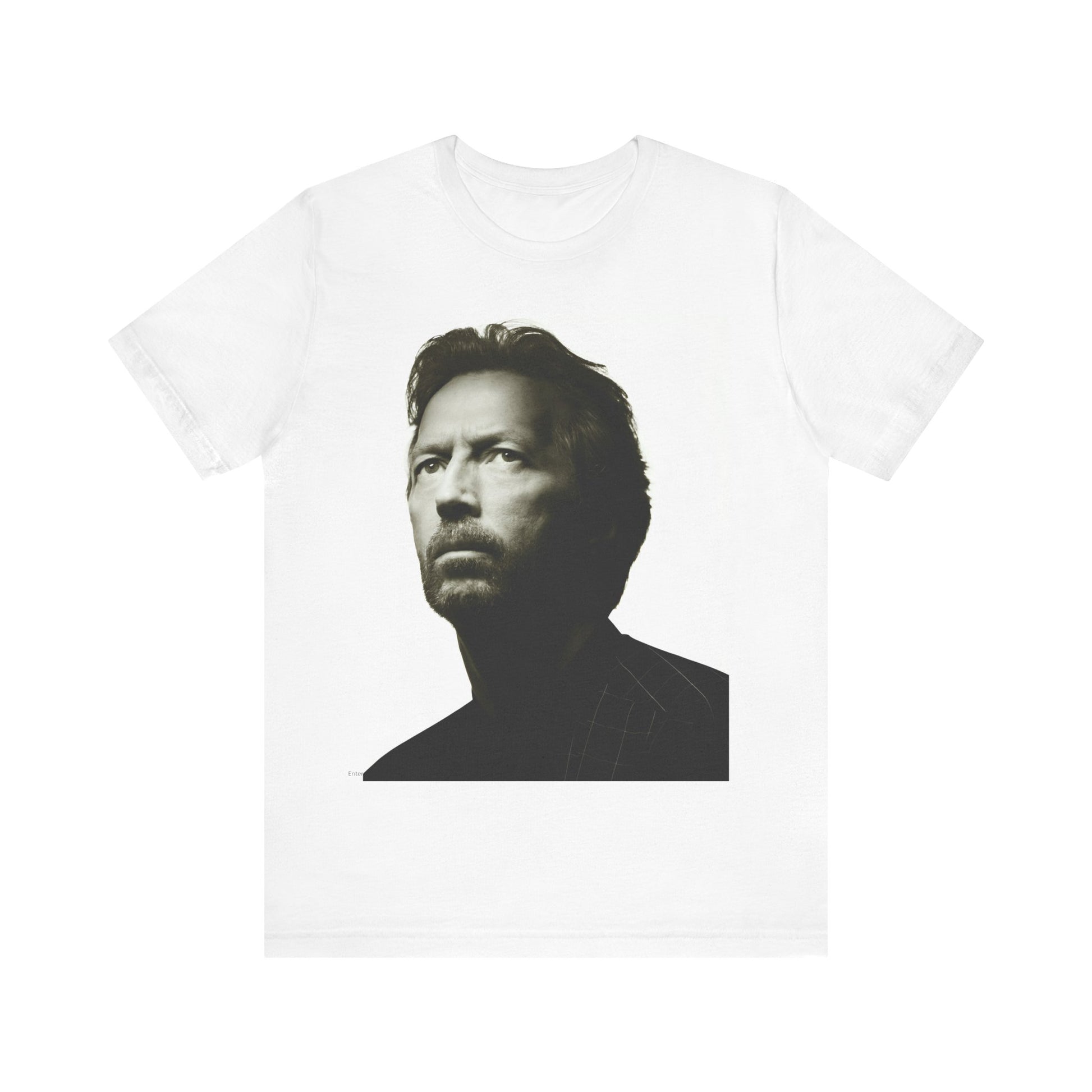 A black graphic t-shirt featuring a retro black and white portrait photo of Eric Clapton.