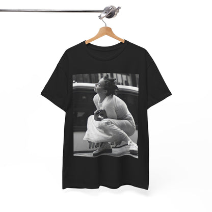 A black graphic t-shirt featuring a graphic of Bjork as an experimental pop icon.