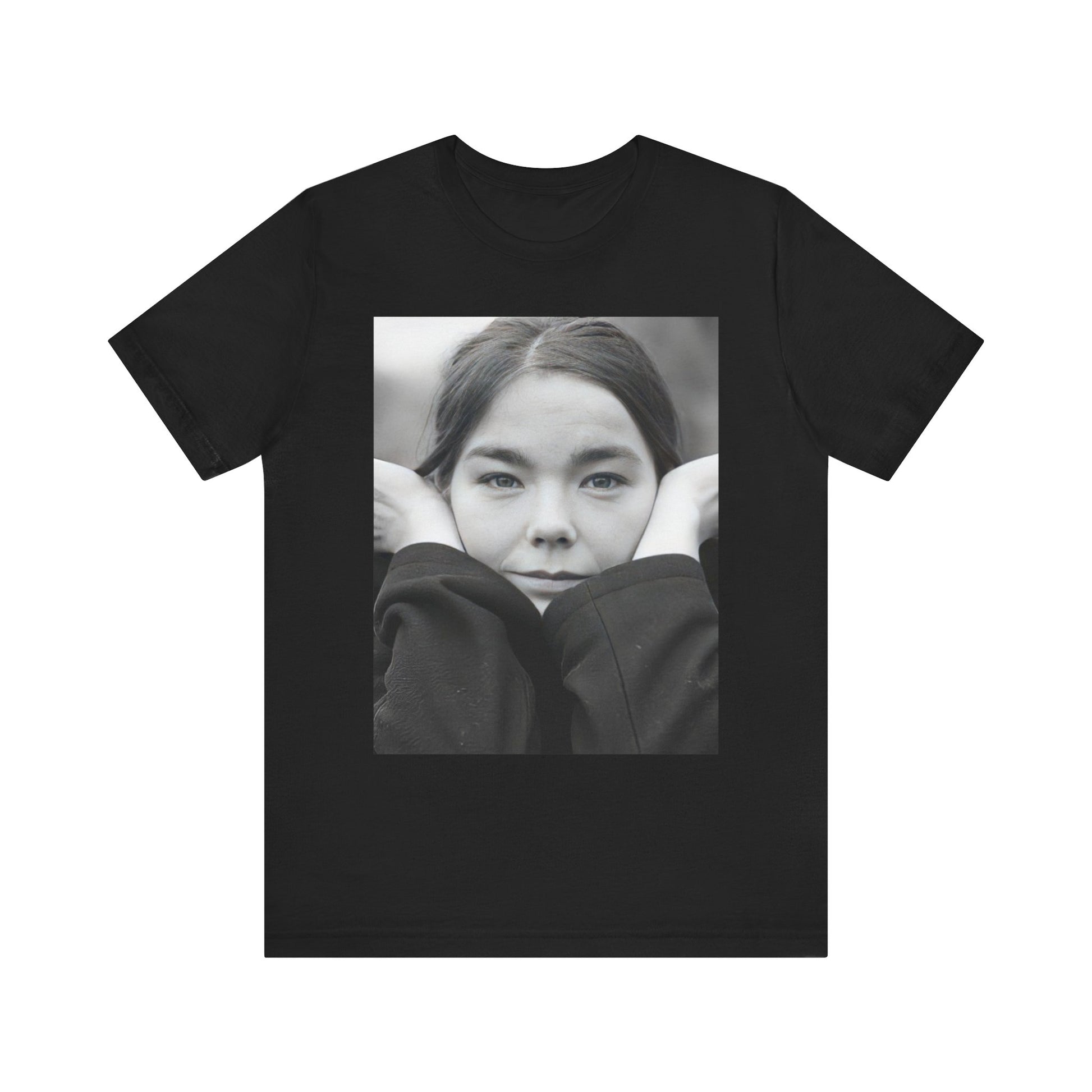 A black graphic t-shirt featuring a black and white portrait photo of Bjork.