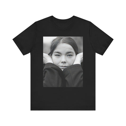 A black graphic t-shirt featuring a black and white portrait photo of Bjork.