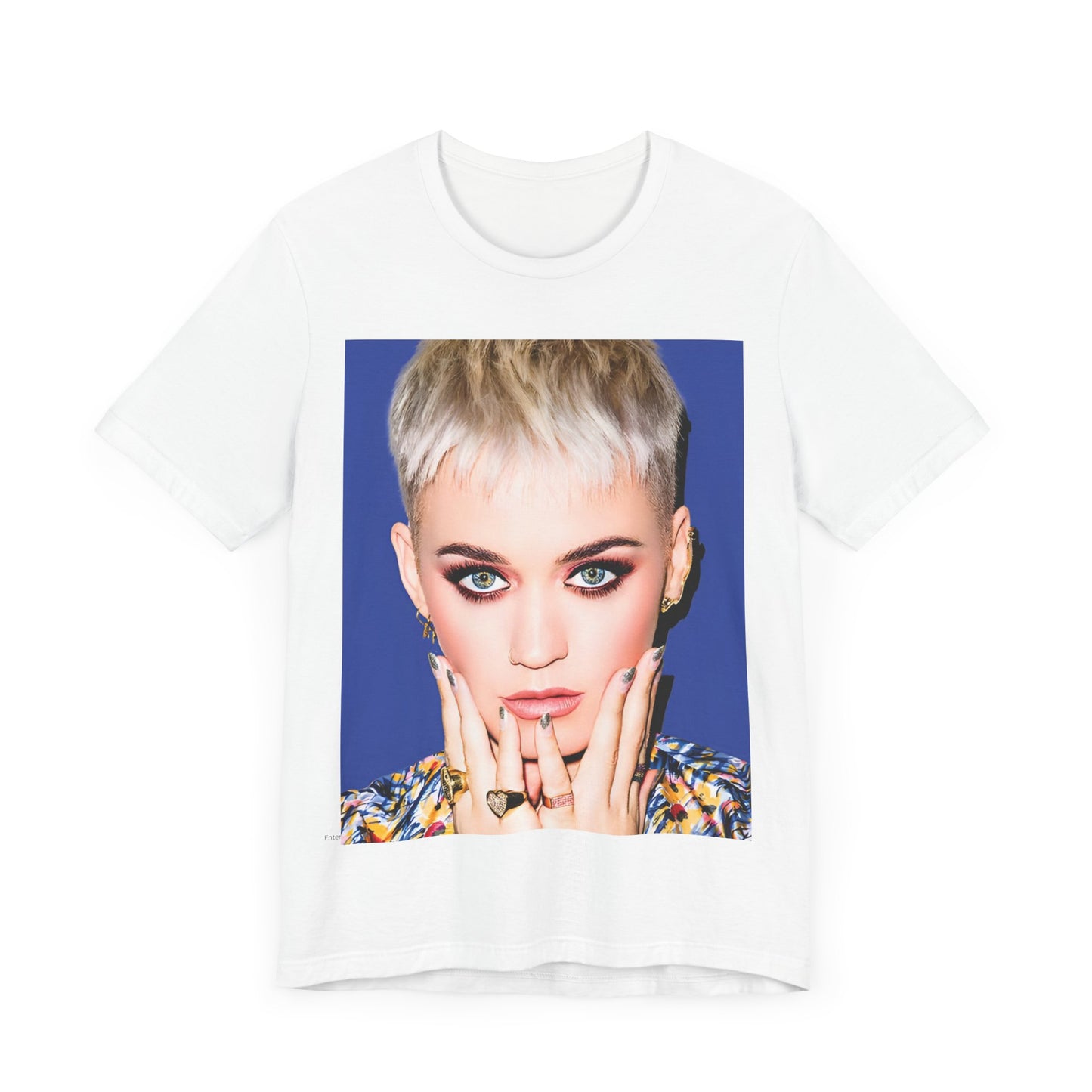 A black graphic t-shirt featuring a graphic of Katy Perry as a global pop phenomenon.