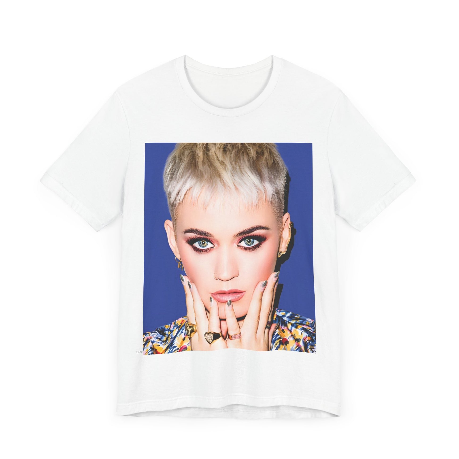 A black graphic t-shirt featuring a graphic of Katy Perry as a global pop phenomenon.