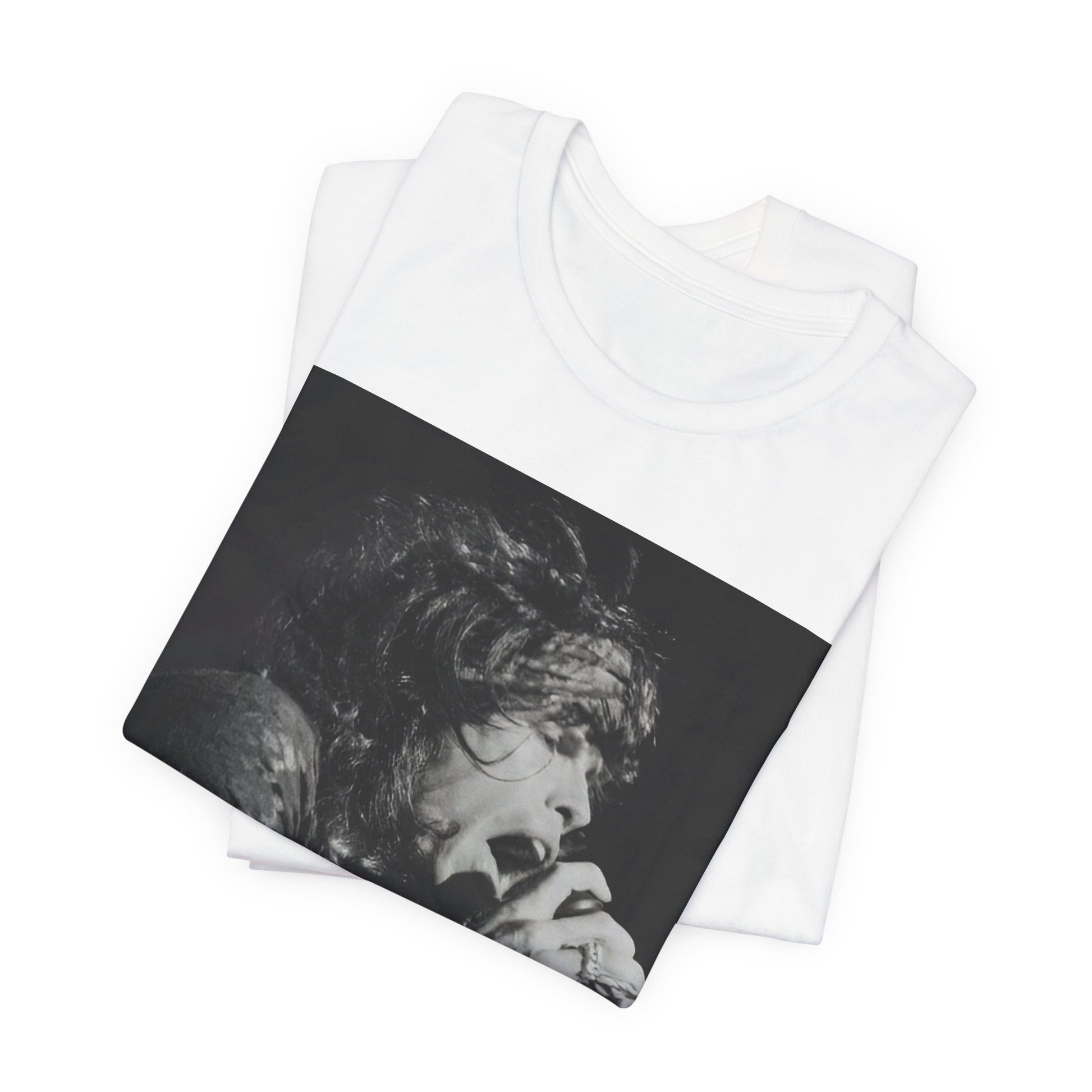 A black graphic t-shirt featuring a retro 70s-style illustration or photo of Aerosmith, designed to evoke their 'On Tour' presence, possibly with band members on stage or tour bus imagery.