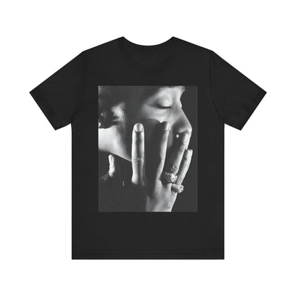 A black graphic t-shirt featuring an iconic West Coast swag graphic of Tupac.