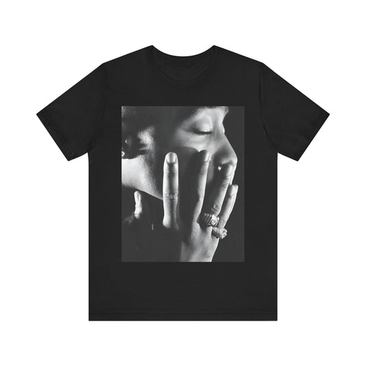 A black graphic t-shirt featuring an iconic West Coast swag graphic of Tupac.