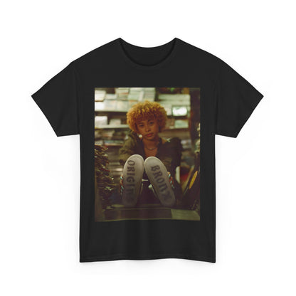 A black graphic t-shirt featuring a stylized graphic of Ice Spice as a TikTok Queen or global sensation.