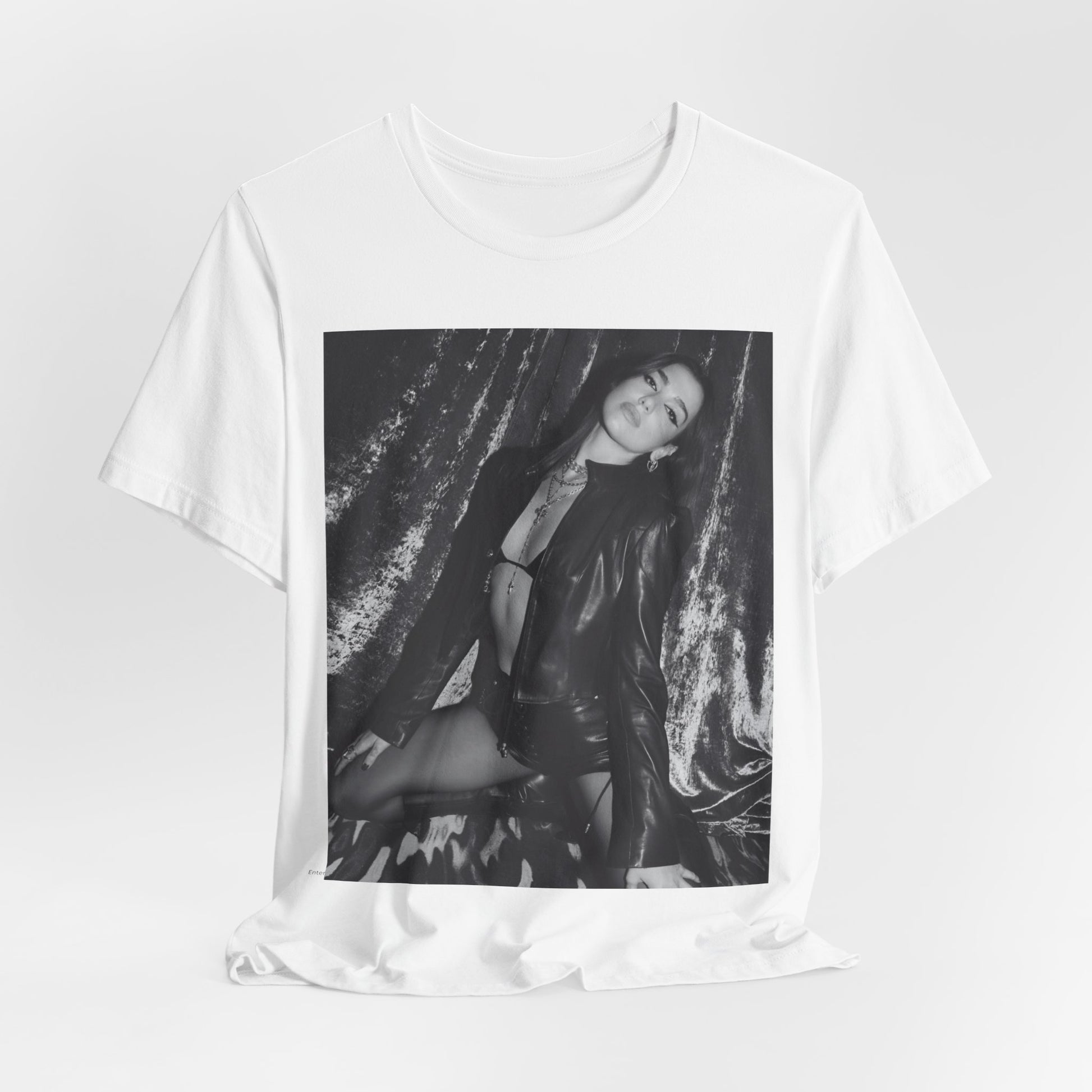 A black graphic t-shirt featuring a black and white portrait photo of Dua Lipa.